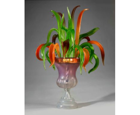 A Glass Lamp in the Form of a Vase  64cm wide, 116cm high, 84cm deep 