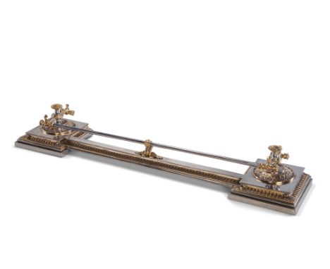 A 19th Century Brass and Steel Fender  the rail  supported by decorative brass uprights at each end to support fire tools,  1