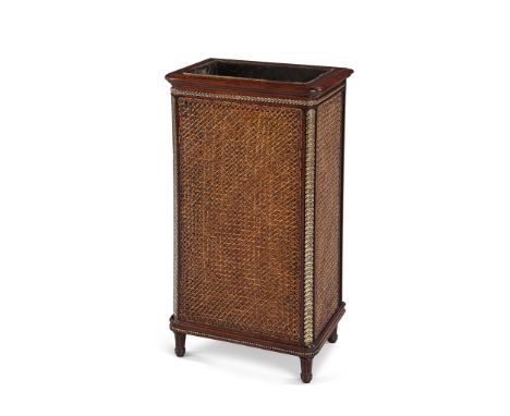 A Late 19th Century Mahogany Stick Stand  in the Louis XVI style, the caned sides with gilt metal coin mouldings to the corne