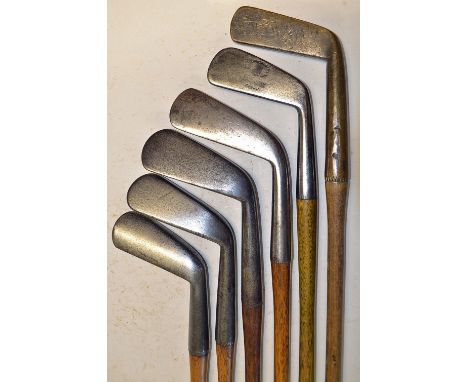 6x smf irons to incl R Forgan & Son St Andrews Crown Model cleek, plus 4x other unnamed cleeks and a brass blade putter - one