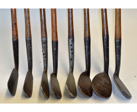 8x Maxwell flanged bottom irons - to incl driving iron, mid iron, 2x mashies, 2x m/niblicks, niblick and a wide sole jigger 