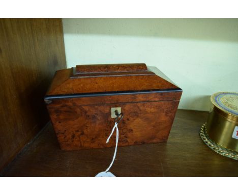 An early 19th century burr walnut sarcophagus form tea caddy, 20.5cm wide. 