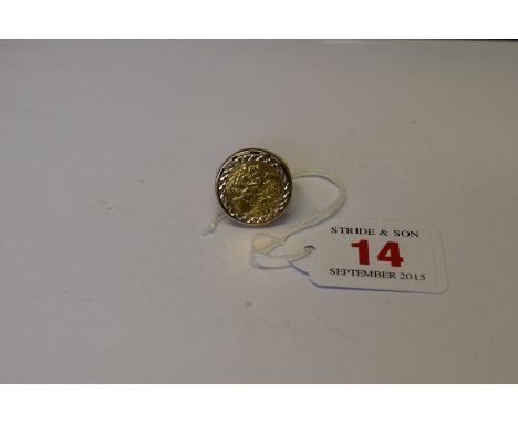 An Elizabeth II gold half sovereign in a 9ct gentleman's ring mount, 9.2 total weight.