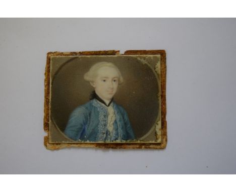French School, late 18th century, head and shoulders portrait miniature of a gentleman, on ivory, indistinctly inscribed vers