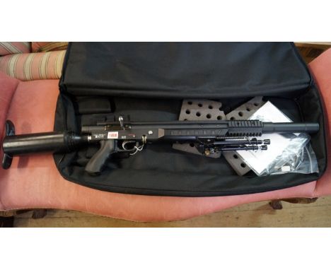 An Edgar Brothers 0.22 calibre Model XVI air rifle, in maker's soft case; together with one magazine; air bottle; silencer; b