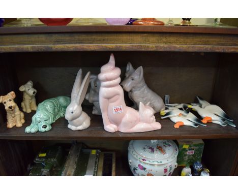 Seven Sylvac animals; together with two sets of three Sylvac flying gull wall plaques. Condition Report: 2 x upright puppies 
