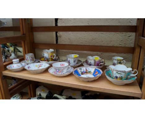 A small quantity of Dresden and other continental porcelain cabinet cups and saucers. 