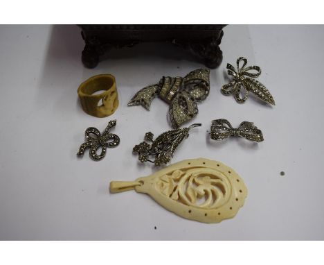 A small quantity of costume jewellery; together with a pewter tea caddy.