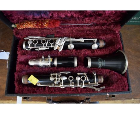 A Corton clarinet, in case. 