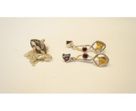 A pair of stylish contemporary silver pendant earrings; together with a ring set moonstones; and a silver open figure of eigh