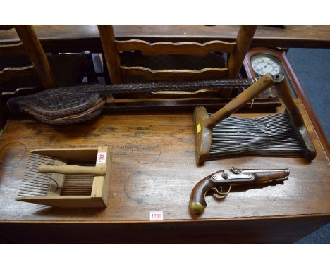 A large pair of mahogany bellows; together with an old berry scoop; a flintlock pistol, (a/f); and another pair of tools. 