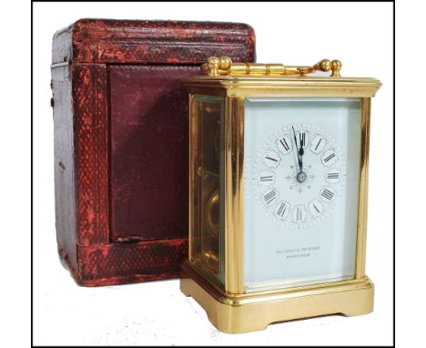 A 19th century gilt brass cased carriage clock by Achille Brocot Paris model no1181. Blue enamel face with white enamel Roman