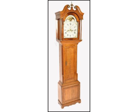 A George III 19th century oak cased longcase clock by John Day, Wakefield. The clock with painted face with facted hands and 