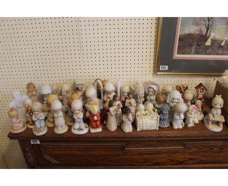 Collection of assorted Hummel and other praying figurines 