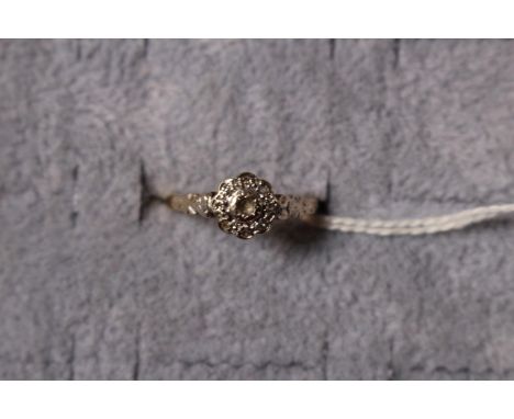 Ladies 18ct Gold Diamond set cluster ring (missing central stone) 3.4g Size M 