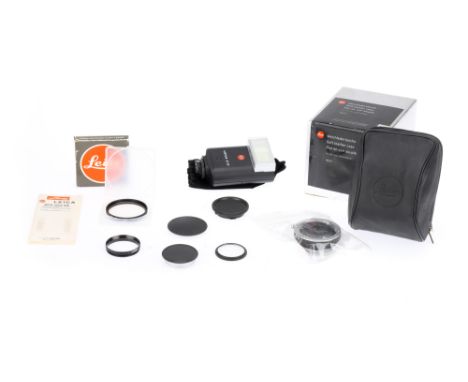 A Mixed Selection of Leica Accessories, to include a Leica SF20, a Leica soft leather case 18611, an adapter for R to M, an E