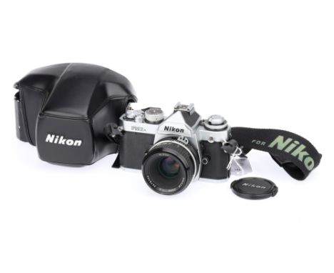 A Nikon FM3A SLR Camera chrome, 2001, serial no. 288066, with Nikon Nikkor f/2 50mm lens, serial no. 3678356, shutter working