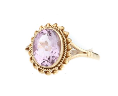 Amethyst Solitaire Ring, in guilloche rub-over precious yellow metal mount, size K 1/2, 2.1g