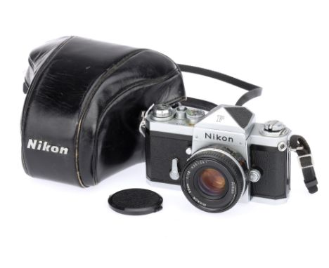 A Nikon F 35mm SLR Camera chrome, serial no. 7129896, plain prism viewfinder, with Nikkor f/1.8 50mm AI-s lens, serial no. 43