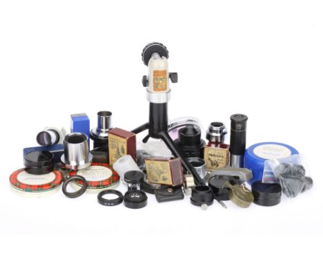 A Small Group of Photographic Accessories and Components items include self-timers, a viewfinder, filters, eyepieces and micr