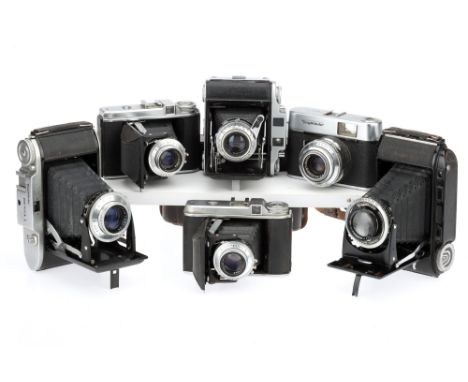 Five Voigtlander and Ensign Folding Cameras comprising a Bessa RF rangefinder folding camera with Heliar f/3.5 10.5cm lens in