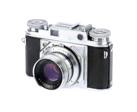 A Voigtlander Prominent Rangefinder Camera, chrome, serial no. B35209, with Voigtlander Ultron f/2 50mm lens, chrome, serial 