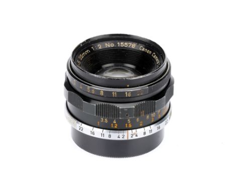 A Canon f/2 35mm Lens, screw mount, black, serial no. 15578, body, F, elements, G, some cleaning marksNote: Lot imported unde