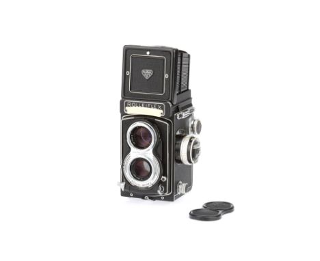 A Rolleiflex T Model III Medium Format TLR Camera, black, serial no. 2243647, body G-VG, shutter working, sticks on slow spee