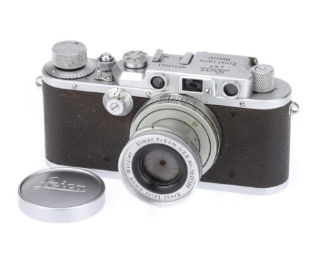 A Leica IIIa Rangefinder Camera, 937/38, chrome, serial no. 243341, with Leitz Elmar f/2.8 50mm lens, chrome, serial no. 1637