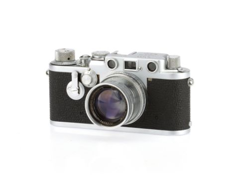 A Leitz Leica IIIf Red Dail Delay 35mm Rangefinder Camera, chrome, serial no.713980 c.1954, body G-VG, shutter working, range