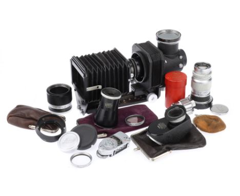 A Good Selection of Leica Camera Accessories, including seveal soft clasp cases, VIDOM, Leitz Elmar f/4 90mm lens and more (a