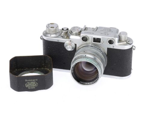 A Leica IIIf Rangefinder Camera, chrome, serial no. 559631, with Leitz Summarit f/1.5 50mm lens, chrome, serial no. 822257, b