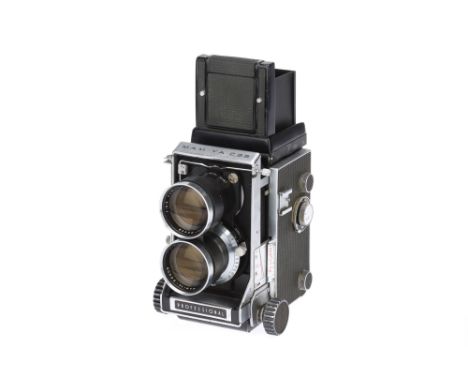 A Mamiya C33 Professional TLR Camera serial no. H 312323 R, with Mamiya-Sekor f/4.5 135mm lenses, serial no. 1123440 and 1136