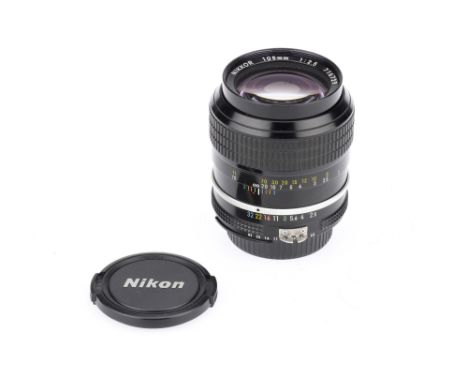 A Nikon AI Nikkor f/2.5 105mm Lens black, serial no. 716729, body G-VG, elements G-VG, slight dust, with caps