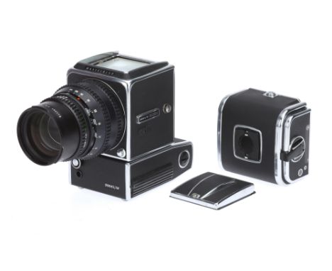 A Hasselblad 500EL/M Medium Format Camera, chrome, serial no. UUE34980, with Carl Zeiss Sonnar T* f/4 150mm lens, black, seri