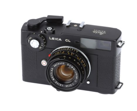 A Leica CL Rangefinder Camera, black, serial no. 1314669, with Leitz Summicron f/2 40mm lens, black, serial no. 2679423, body