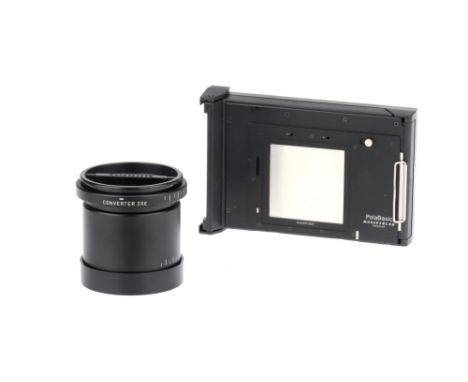 Hasselblad Accessories comprising a Tele Converter 2XE, black, serial no. 421SS1122, body VG, elements P-F, condensation haze