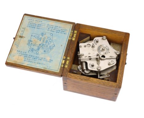 Japanese WWII Period Clockwork&nbsp;Ordnance Timer, complete with key and in oak case