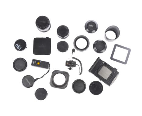 A Mixed Selection of Camera Accessories, to include a Mamiya-Sekor extension tube, a range of caps & hoods, & a teleconverter