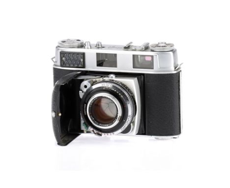 A Kodak Retina III 35mm Rangefinder Camera, chrome, shutter working but sticks on slow speeds, rangefinder patch is clear & b