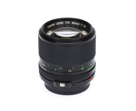 A Canon FD f/1.8 85mm Lens, black, serial no. 44745, body, VG-E, elements, G-VG, some light internal fungus to middle group, 