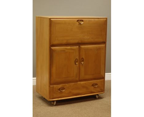 Ercol light elm finish fall front drinks cabinet with cupboard and drawer, W83cm, H110cm, D44cm   Condition Report   Click he