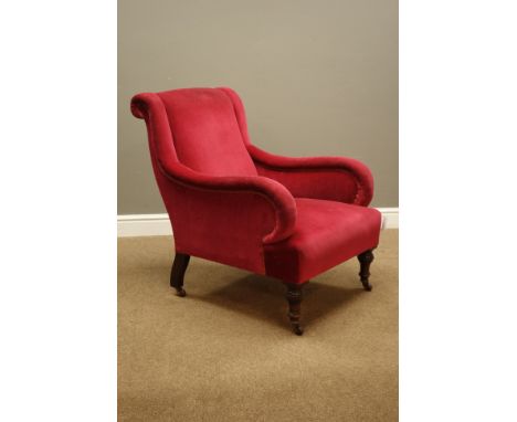 Late Victorian mahogany framed armchair, turned supports with ceramic castors, sprung seat and back upholstered in pink fabri