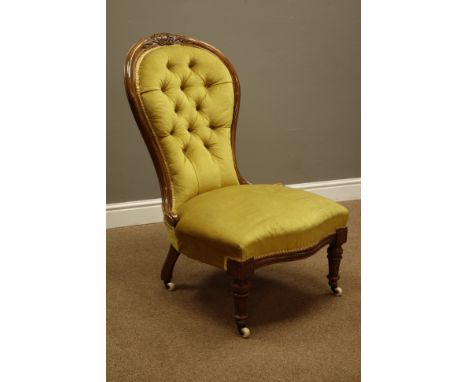 Victorian mahogany framed spoon back nursing chair, carved cresting rail, upholstered serpentine seat and buttoned back, turn