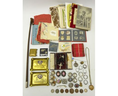 'Ypres' ring, small album containing black and white portrait photographs, riding whip, two small Ypres souvenir trays, decor