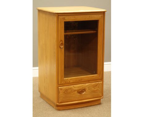 Ercol light finish elm cabinet fitted with bevel glazed door and drawer, W56cm, H93cm, D49cm   Condition Report   Click here 