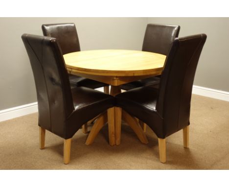 Light oak circular extending dining table on turned column with splayed supports (D106cm - L146cm (extended)), and high back 