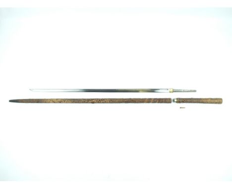 A Meiji Period Japanese Sword Stick, 60cm fullered blade with one mekugi-ana, the tsuka and saya of wood and lacquered to res