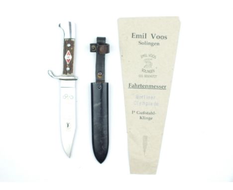 A Rare Olympic Hitler Youth Dagger and Paper Envelope, 11.75cm clipped back blade by EMIL VOOS SOLINGEN etched ZUM RUHME DES 