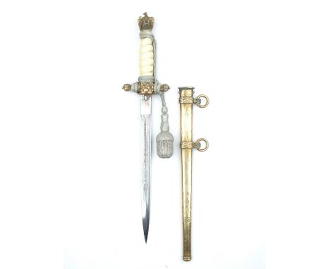 A Third Reich Kriegsmarine Officer's Dagger, 25cm blade by E & F HORSTER SOLINGEN, etched with scrolling foliage, fouled anch